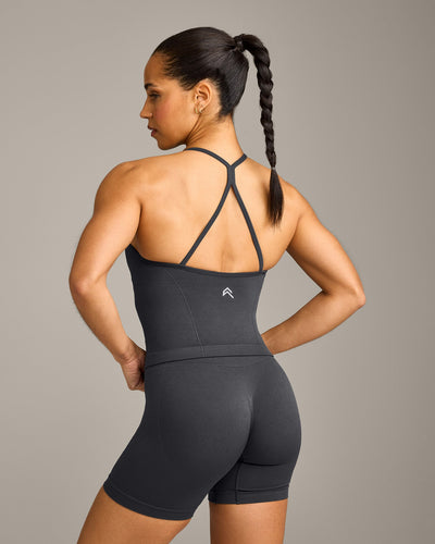 EnhanceLift™ Seamless Strappy Racer Vest with Built in Bra Shelf with Grey Logo | Coal