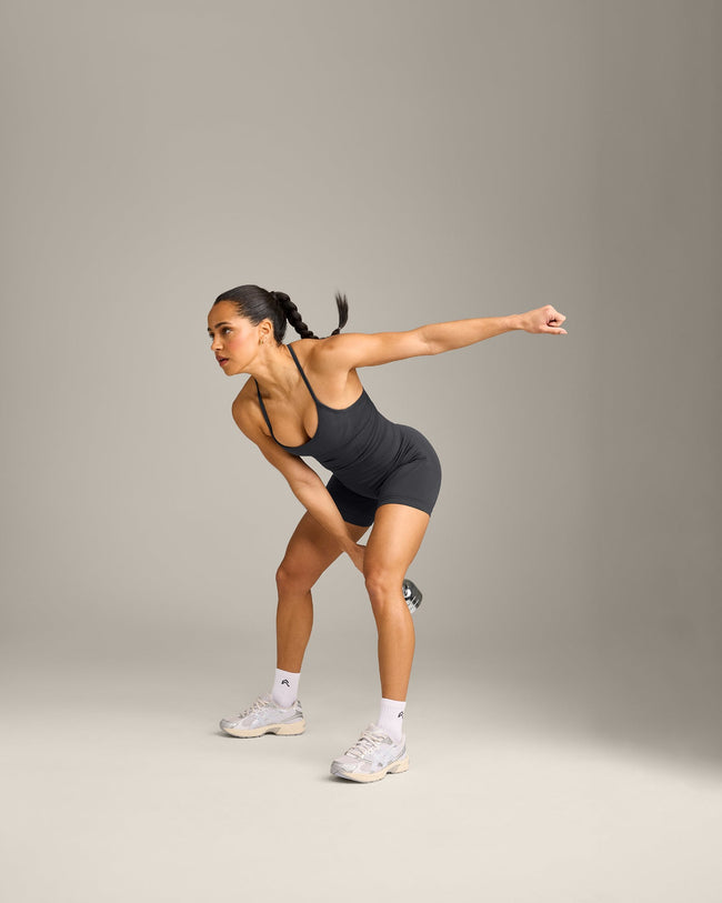 EnhanceLift™ Seamless Strappy Racer Vest with Built in Bra Shelf with Grey Logo | Coal