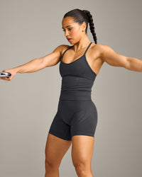 EnhanceLift™ Seamless Strappy Racer Vest with Built in Bra Shelf with Grey Logo | Coal