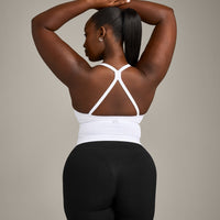 EnhanceLift™ Seamless Strappy Racer Vest with Built in Bra Shelf with Grey Logo | White