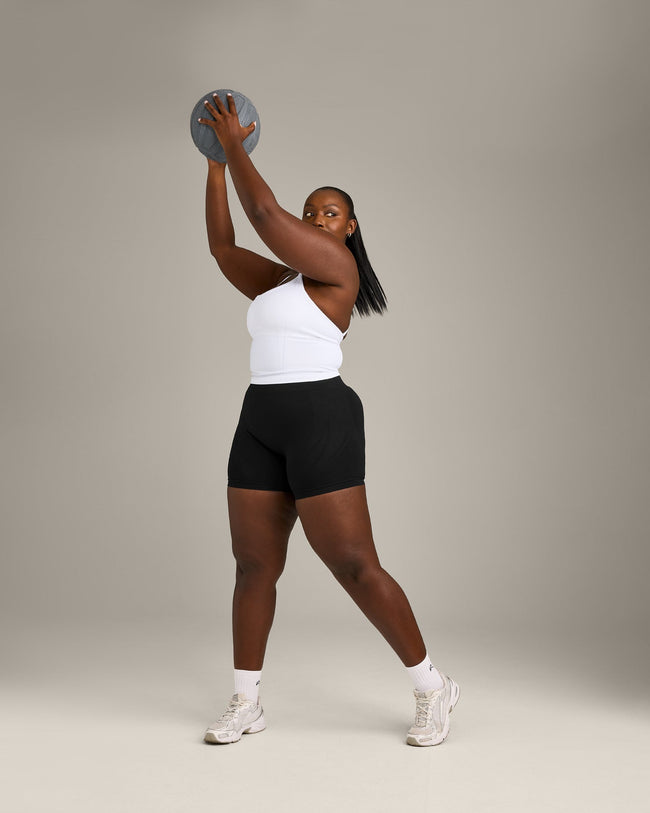 EnhanceLift™ Seamless Strappy Racer Vest with Built in Bra Shelf with Grey Logo | White