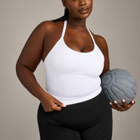 EnhanceLift™ Seamless Strappy Racer Vest with Built in Bra Shelf with Grey Logo | White