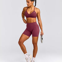 EnhanceLift™ Seamless Strappy Sports Bra with Grey Logo | Burnt Maroon