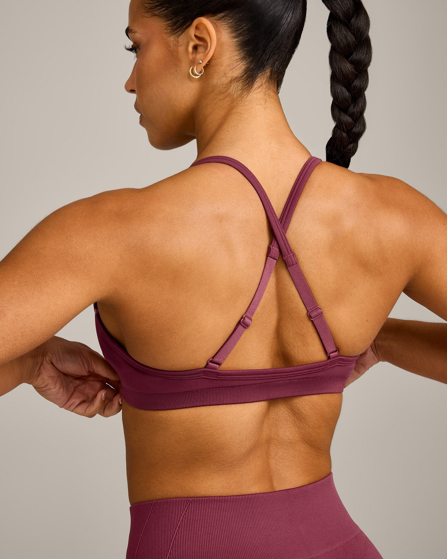 EnhanceLift™ Seamless Strappy Sports Bra with Grey Logo | Burnt Maroon