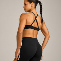 EnhanceLift™ Seamless Strappy Sports Bra with Grey Logo | Black