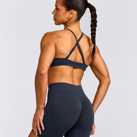 EnhanceLift™ Seamless Strappy Sports Bra with Grey Logo | True Blue