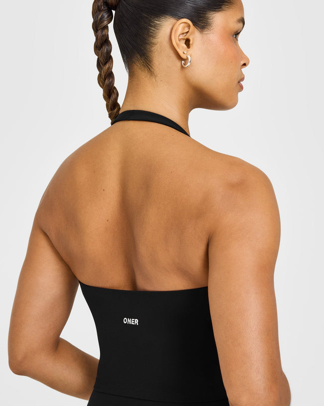 SoftMotion™ Halter Neck Mid Vest with Built in Bra Shelf with White Logo | Black