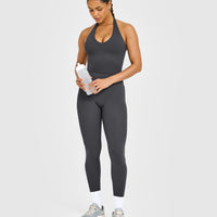 SoftMotion™ Halter Neck Mid Vest with Built in Bra Shelf with White Logo | Coal