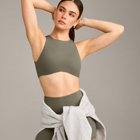SoftMotion™ High Neck Sports Bra with Grey Logo | Alpine Green