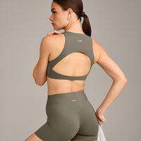 SoftMotion™ High Neck Sports Bra with Grey Logo | Alpine Green