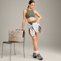 SoftMotion™ High Neck Sports Bra with Grey Logo | Alpine Green