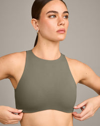 SoftMotion™ High Neck Sports Bra with Grey Logo | Alpine Green