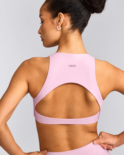SoftMotion™ High Neck Sports Bra with Gray Logo | Chalk Pink