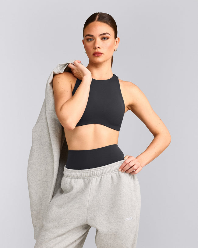 SoftMotion™ High Neck Sports Bra with Grey Logo | Coal