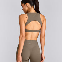 SoftMotion™ High Neck Sports Bra with Grey Logo | Moss Brown