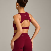 SoftMotion™ High Neck Sports Bra with Grey Logo | Ruby Red