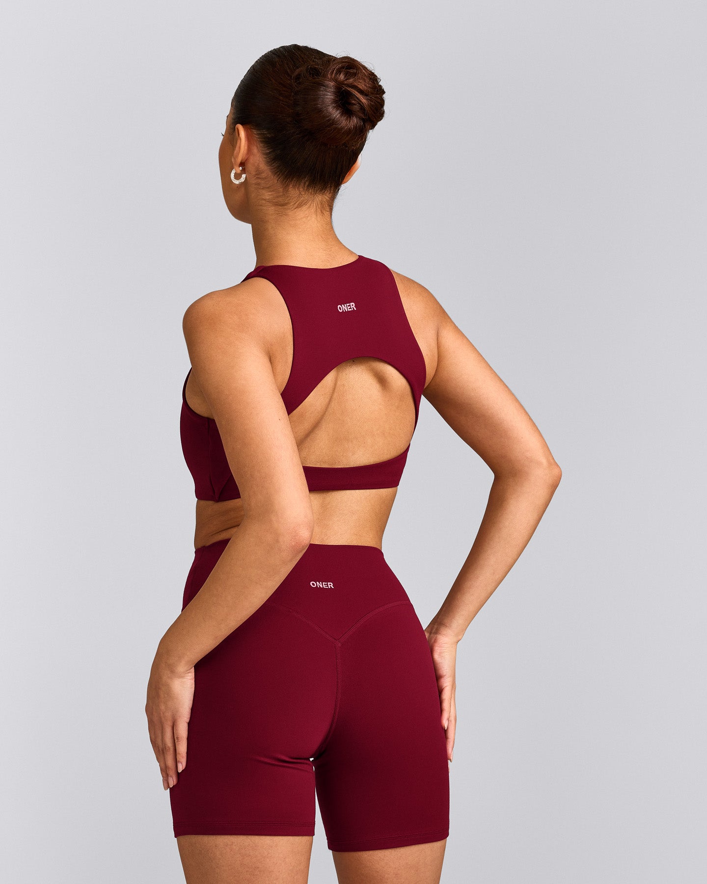 SoftMotion™ High Neck Sports Bra with Grey Logo | Ruby Red