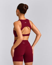 SoftMotion™ High Neck Sports Bra with Grey Logo | Ruby Red