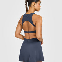 SoftMotion™ High Neck Sports Bra with White Logo | True Blue