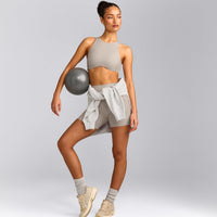 SoftMotion™ High Neck Sports Bra with White Logo | Warm Sand