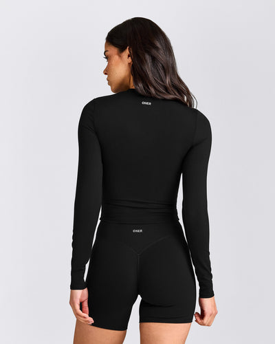 SoftMotion™ Long Sleeve Mid Top with Grey Logo | Black