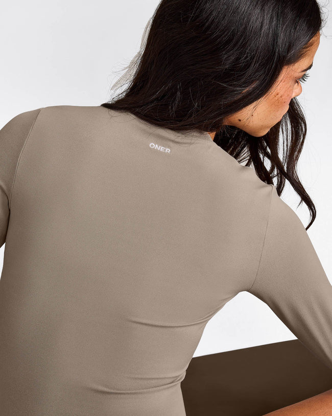 SoftMotion™ Long Sleeve Top with White Logo | Warm Sand