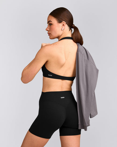 SoftMotion™ Minimal Halter Neck Bralette with Gray Logo | Black