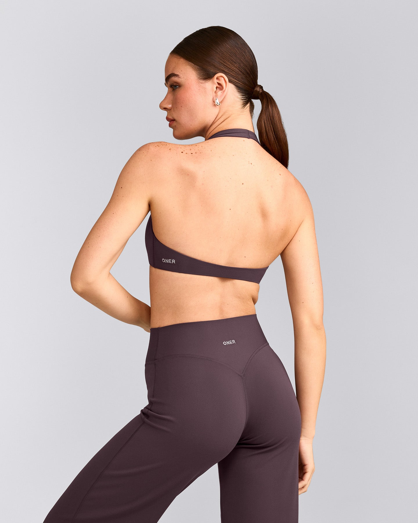 SoftMotion™ Minimal Halter Neck Bralette with Gray Logo | Dark Umber Brown