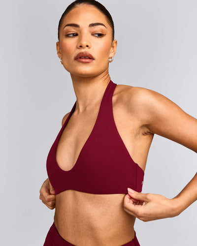 SoftMotion™ Minimal Halter Neck Bralette with Gray Logo | Ruby Red