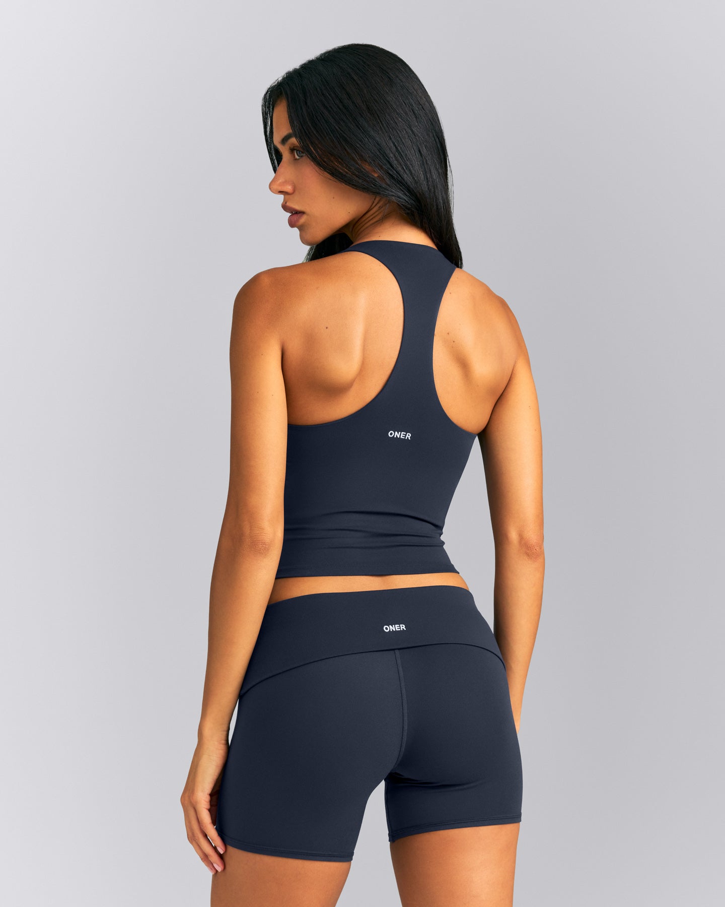 SoftMotion™ Racer Back Mid Tank Top with Built in Bra Shelf New Branding | True Blue