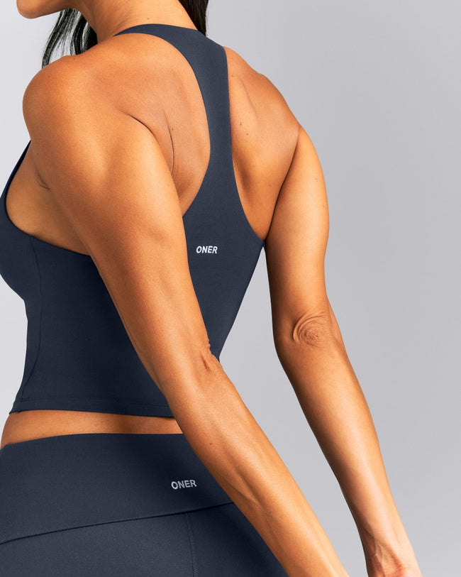 SoftMotion™ Racer Back Mid Tank Top with Built in Bra Shelf New Branding | True Blue