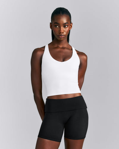 SoftMotion™ Racer Back Mid Tank Top with Built in Bra Shelf New Branding | White