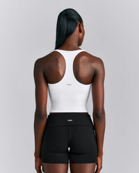 SoftMotion™ Racer Back Mid Tank Top with Built in Bra Shelf New Branding | White