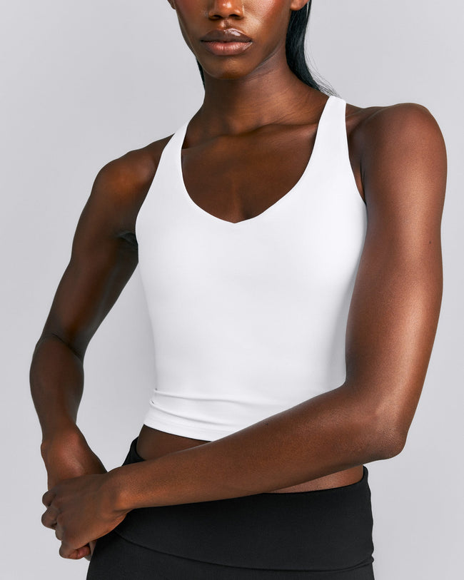 SoftMotion™ Racer Back Mid Tank Top with Built in Bra Shelf New Branding | White