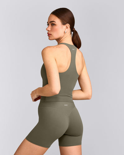 SoftMotion™ Racer Back Mid Vest with Built in Bra Shelf with Grey Logo | Alpine Green