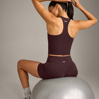 SoftMotion™ Racer Back Mid Vest with Built in Bra Shelf with Grey Logo | Plum Brown