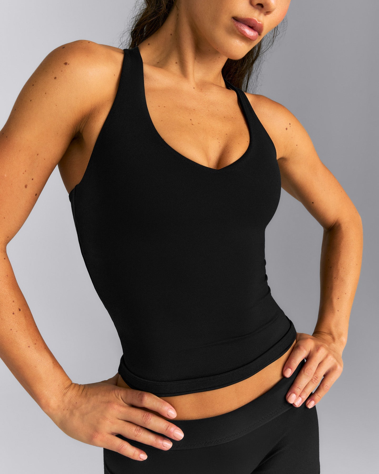 SoftMotion™ Racer Back Tank Top with Built in Bra Shelf New Branding | Black