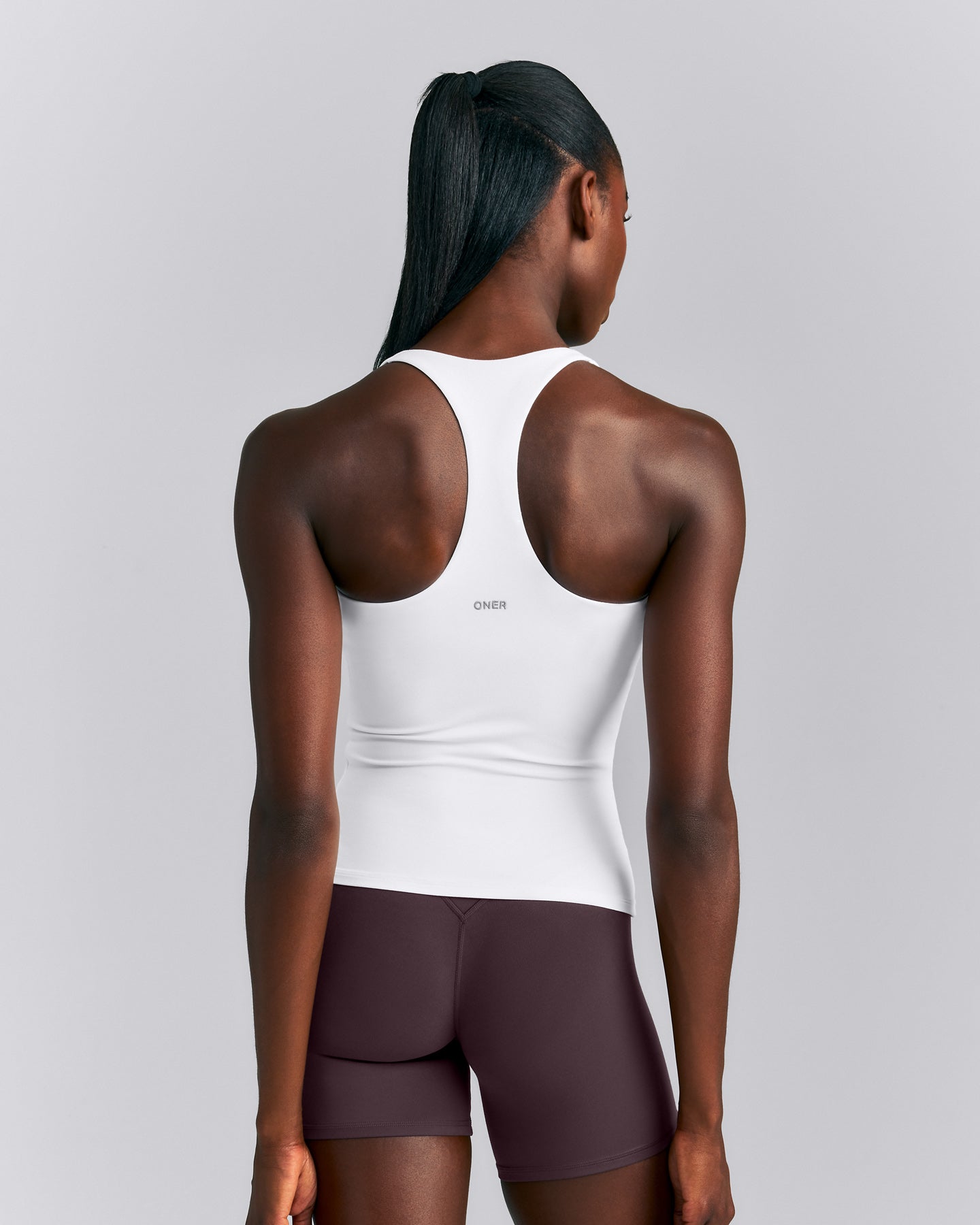 SoftMotion™ Racer Back Tank Top with Built in Bra Shelf New Branding | White