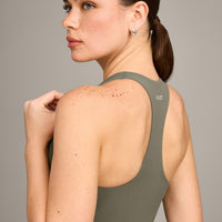 SoftMotion™ Racer Back Vest with Built in Bra Shelf with Grey Logo | Alpine Green