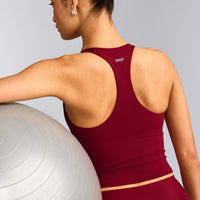 SoftMotion™ Racer Back Mid Vest with Built in Bra Shelf with Grey Logo | Ruby Red