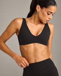 SoftMotion™ Scoop Back Bralette with Grey Logo | Black