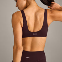 SoftMotion™ Scoop Back Bralette with Grey Logo | Plum Brown
