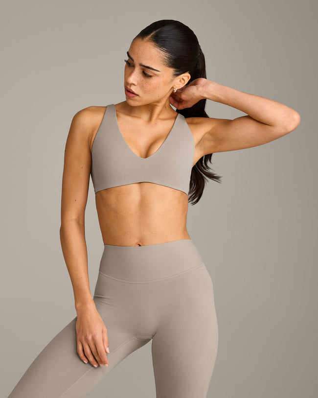 SoftMotion™ Scoop Back Bralette with White Logo | Warm Sand