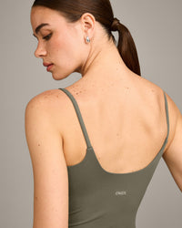 SoftMotion™ Strappy Vest with Built in Bra Shelf with Grey Logo | Alpine Green