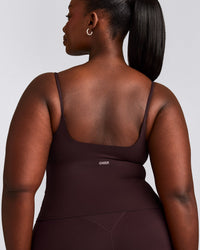 SoftMotion™ Strappy Mid Tank Top with Built in Bra Shelf with Gray Logo | Plum Brown