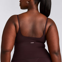 SoftMotion™ Strappy Mid Tank Top with Built in Bra Shelf with Gray Logo | Plum Brown