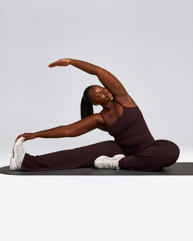 SoftMotion™ Strappy Mid Tank Top with Built in Bra Shelf with Gray Logo | Plum Brown