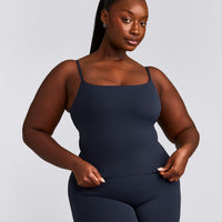 SoftMotion™ Strappy Mid Vest with Built in Bra Shelf with Grey Logo | True Blue