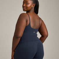 SoftMotion™ Strappy Mid Vest with Built in Bra Shelf with Grey Logo | True Blue