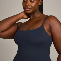 SoftMotion™ Strappy Mid Vest with Built in Bra Shelf with Grey Logo | True Blue